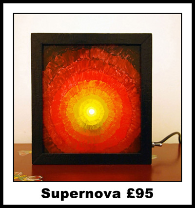 Unique hand crafted art lamp made from recycled materials. This original lamp with an soft inviting light creates a warm and modern atmosphere in any room. Free delivery